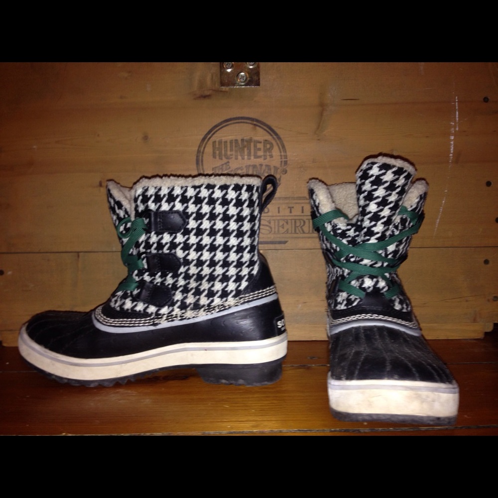 Black and white Sorel boots